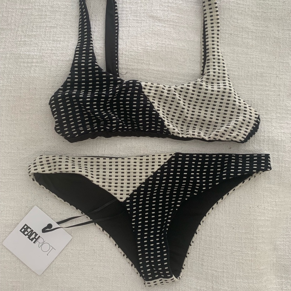 Beach riot bathing suit.Top is small bottom medium